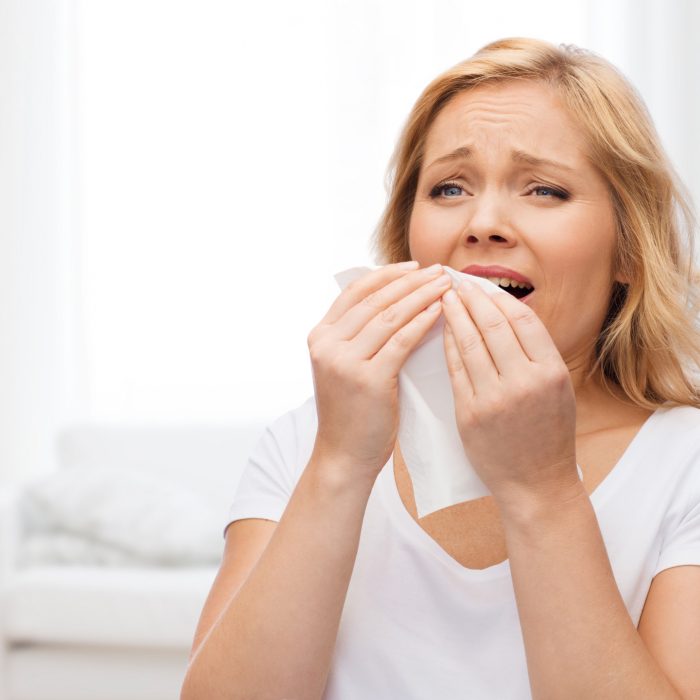 balloon sinuplasty - women sneezing